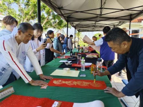 創新春聯迎春意 | 大鵬灣春聯嵌入QR碼推動低碳旅遊